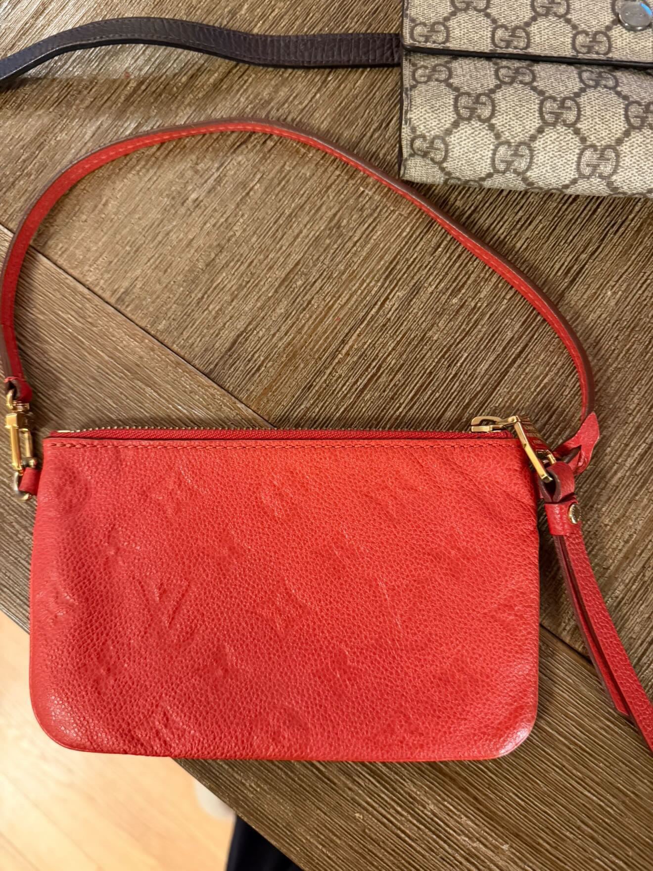Louis Vuitton Red Empreinte leather mini pochette